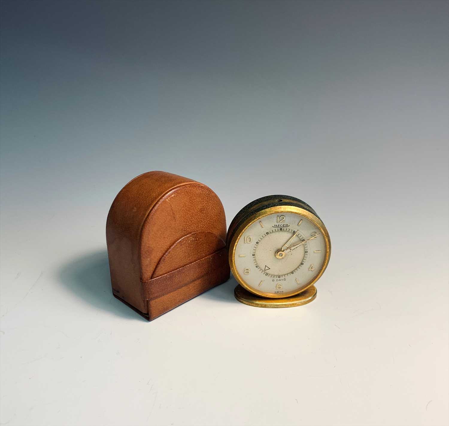 Lot 2610 - Jaeger small 8 day alarm clock with leather pouch