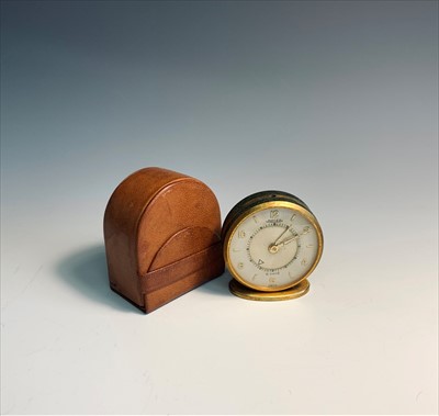 Lot 2610 - Jaeger small 8 day alarm clock with leather pouch
