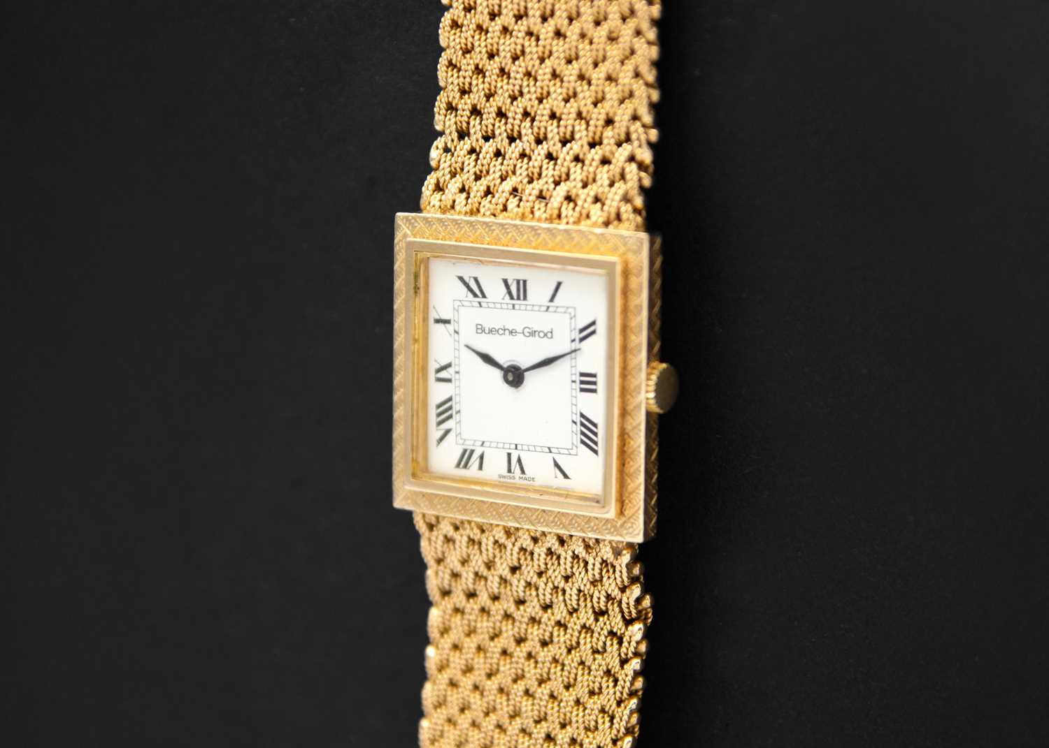 Lot 153 - BUECHE-GIROD - A 9ct gentleman's mesh bracelet quartz wristwatch.