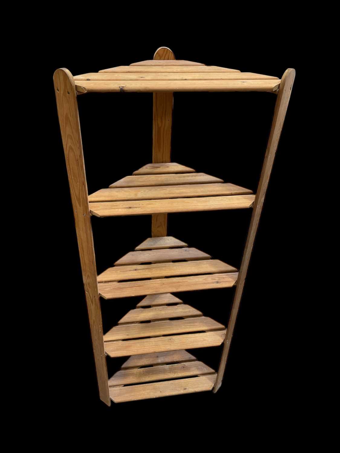 Lot 192 - A Pine Corner unit with slatted shelves. 50 x...