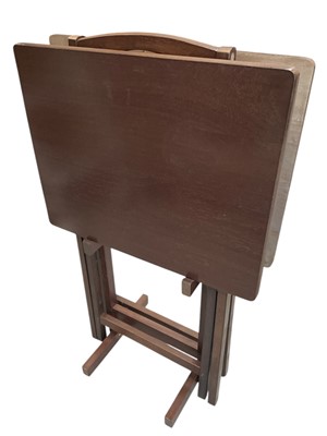 Lot 200 - Two Wooden Folding Tray Tables on a Storage...