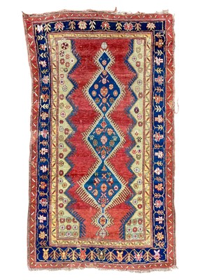 Lot 611 - A Turkish rug, circa 1900-1920.