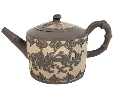 Lot 473 - An English dry-bodied stoneware teapot and cover.