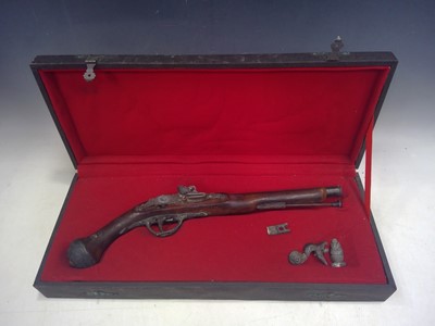 Lot 1 - A Cased, Reproduction Flint Lock Pistol. The...