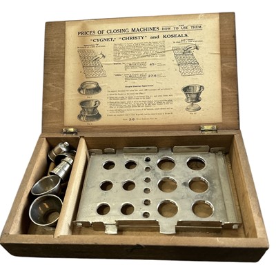 Lot 65 - A vintage boxed medical cachet maker.