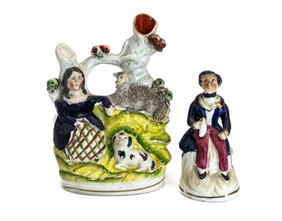 Lot 486 - A Victorian Staffordshire pottery flat back figure group of a harvest couple.