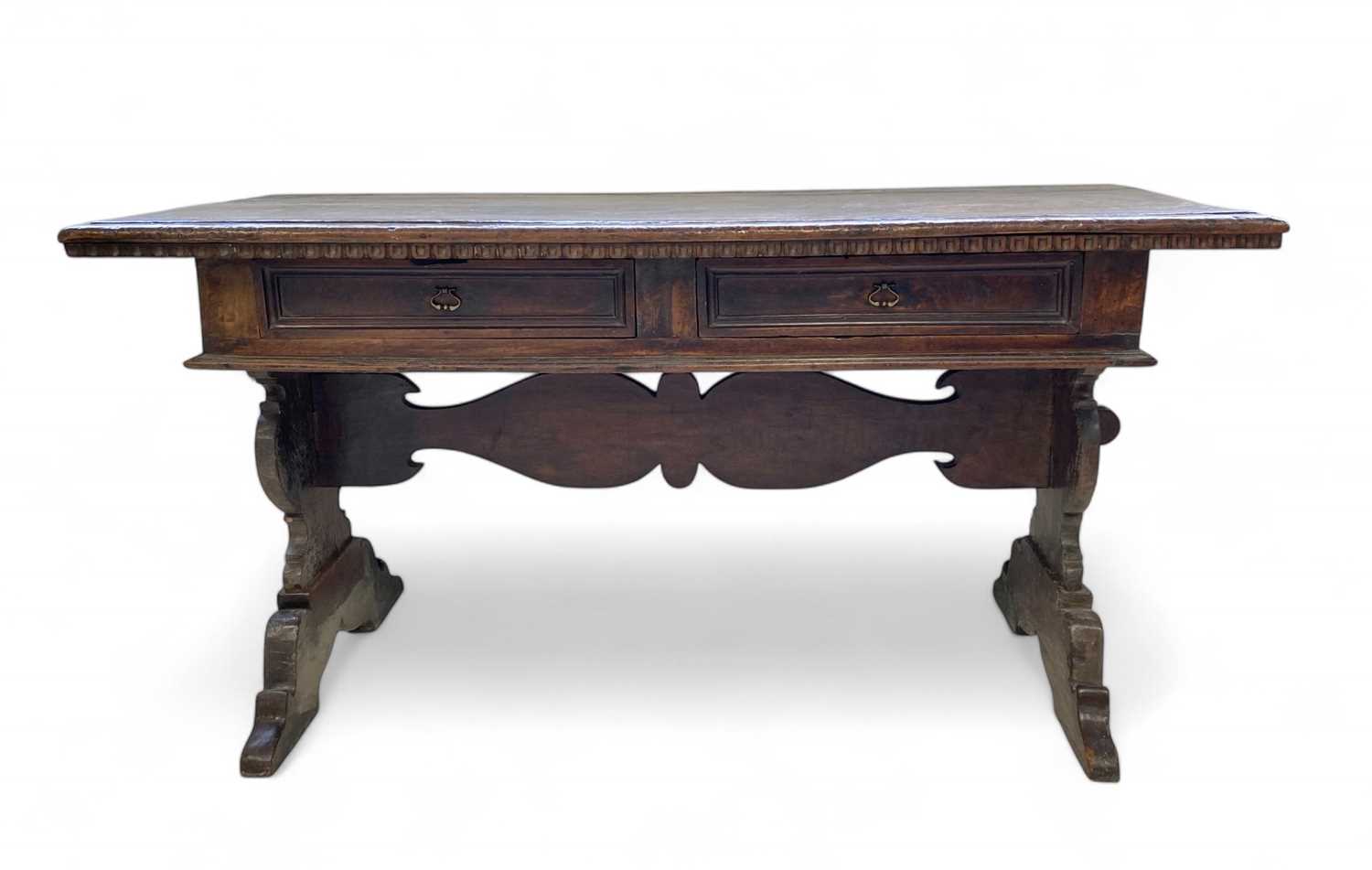 Lot An Italian walnut writing table.