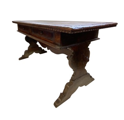 Lot An Italian walnut writing table.