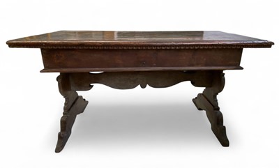 Lot An Italian walnut writing table.