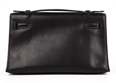 Lot 301 - HERMES - A Kelly Pochette clutch bag with Palladium hardware.