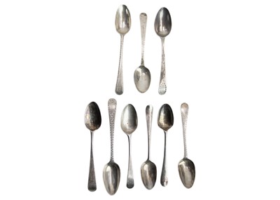 Lot 1048 - Nine assorted Georgian silver teaspoons.