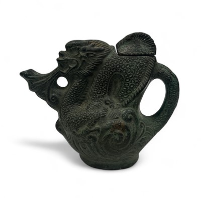 Lot 5 - A Chinese bronze dragon teapot, impressed seal...