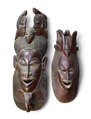 Lot 164 - A large African carved mask.