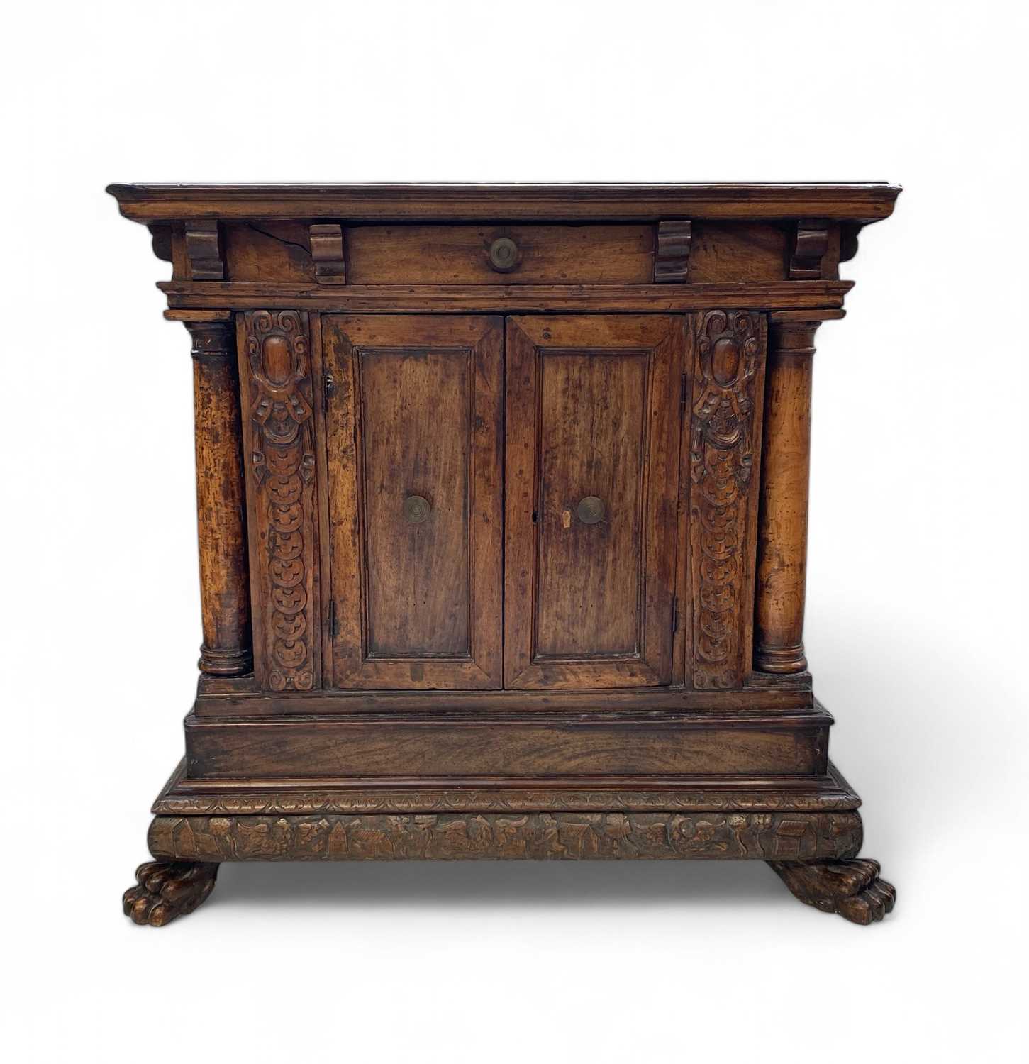 Lot 1096 - An Italian Baroque walnut credenza.