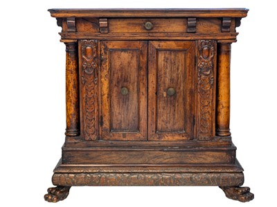 Lot 1096 - An Italian Baroque walnut credenza.