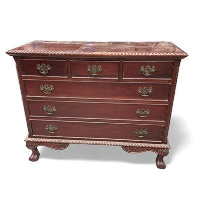 Lot 47 - A Reproduction Chest of Drawers. The Chest...