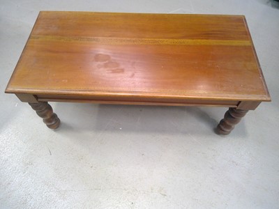 Lot 57 - A Coffee Table. The Table measures 110cm wide...