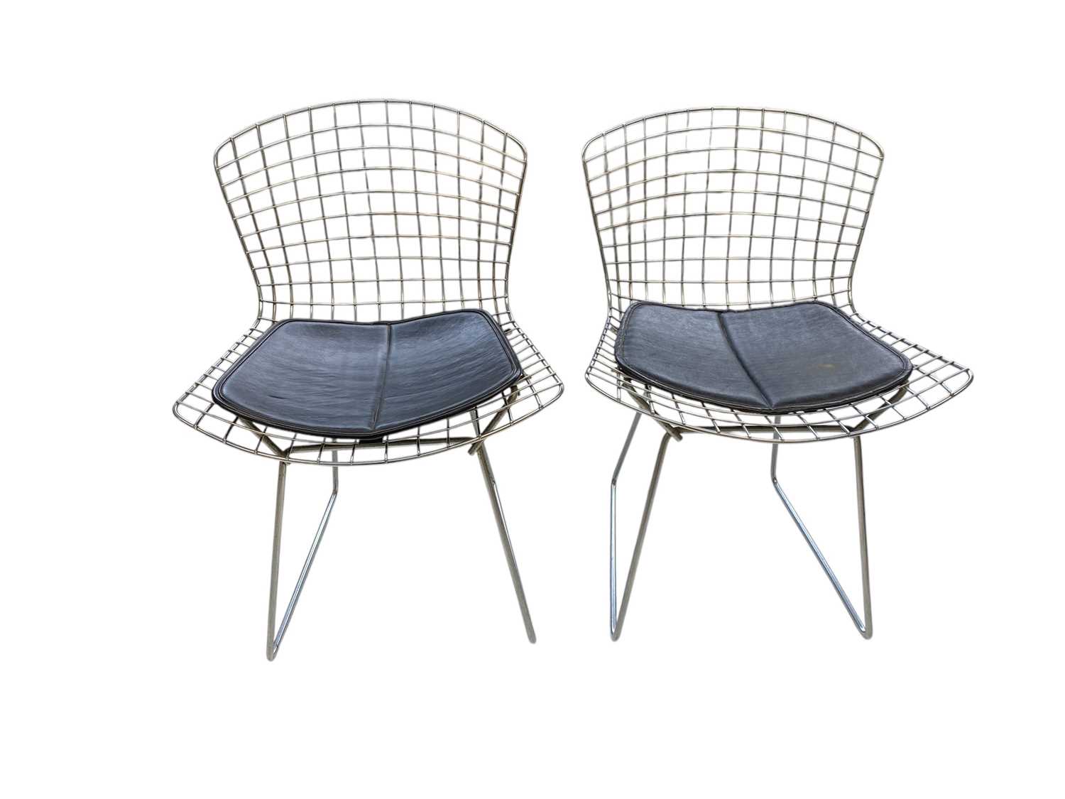 Lot 1033 - After Harry Bertoia, two chrome wire chairs.