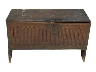 Lot 1142 - A 17th century oak plank coffer.