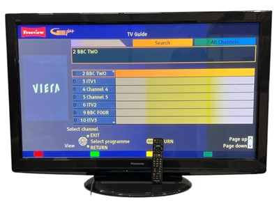 Lot 143 - A 50" Panasonic TV with a remote control. It...