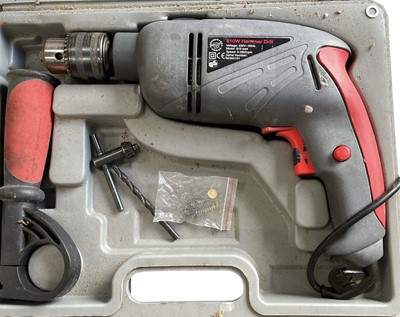 Lot 105 - A Performance Power 810W hammer drill.