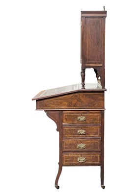 Lot 644 - A Victorian rosewood and inlaid Davenport cabinet.