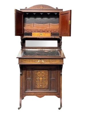 Lot 644 - A Victorian rosewood and inlaid Davenport cabinet.