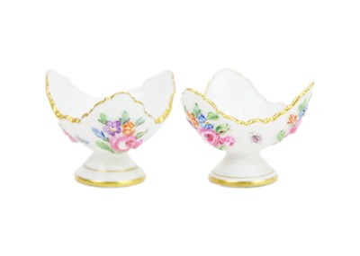 Lot 489 - A rare pair of Meissen sake cups on stands.