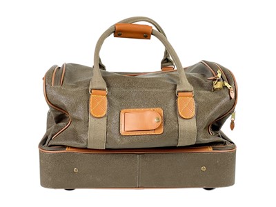 Lot 351 - MULBERRY - A Scotchgrain holdall in two sections with rolling wheels.
