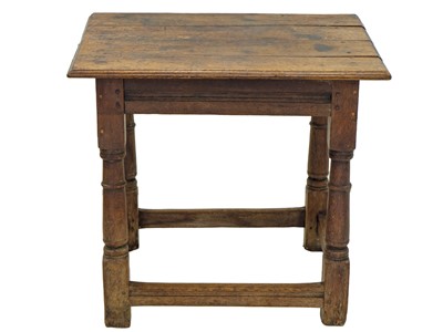 Lot 1149 - An English oak centre or altar table.