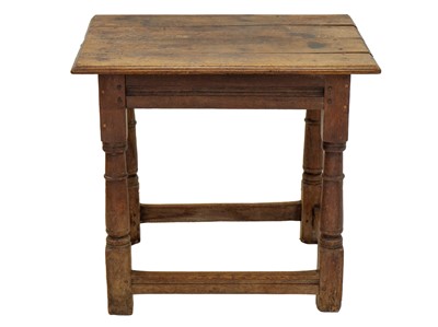 Lot 1149 - An English oak centre or altar table.
