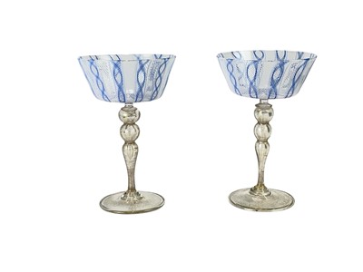 Lot 406 - A pair of Venetian latticino glass goblets or stemmed bowls.