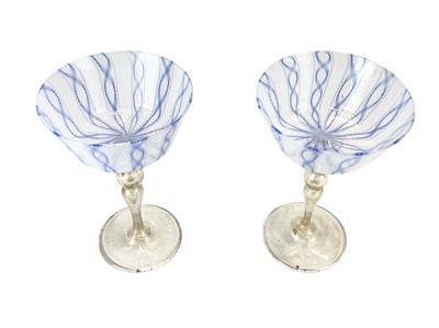 Lot 406 - A pair of Venetian latticino glass goblets or stemmed bowls.