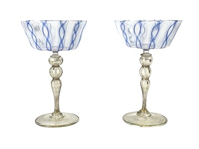 Lot 406 - A pair of Venetian latticino glass goblets or stemmed bowls.