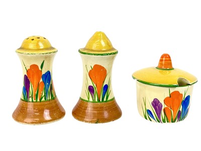 Lot 369 - A Clarice Cliff Crocus pattern muffineer cruet set.