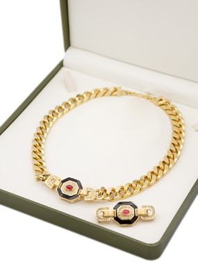 Lot 358 - CHRISTIAN DIOR - A gold-tone enamel and paste set pendant necklace and brooch set.