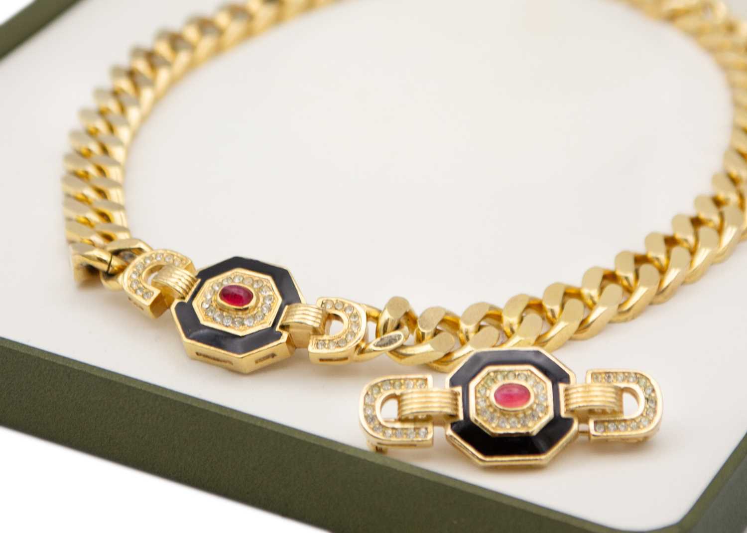 Lot 358 - CHRISTIAN DIOR - A gold-tone enamel and paste set pendant necklace and brooch set.