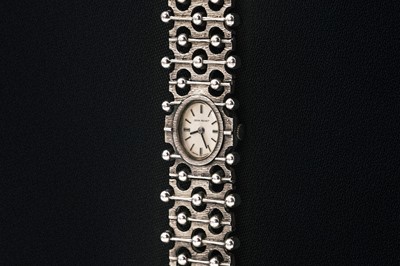 Lot 118 - JEAN RENET - A 1970's silver retro lady's manual wind bracelet wristwatch.