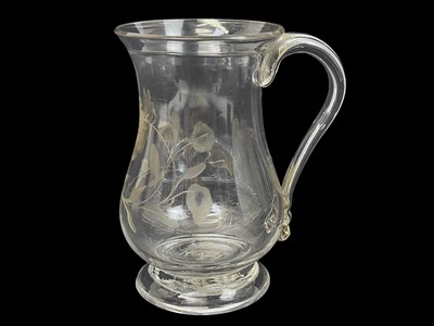 Lot 415 - A George III baluster glass small mug.