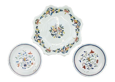 Lot 371 - Two Rouen faïence saucers.