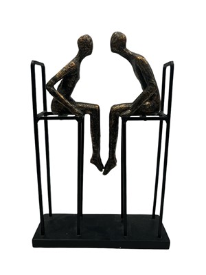 Lot 10 - A contemporary metal and resin sculpture of a...