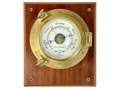 Lot 241 - A brass Royal Mariner bulkhead barometer.