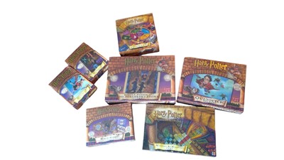 Lot 61 - Four unopened Harry Potter games and three...