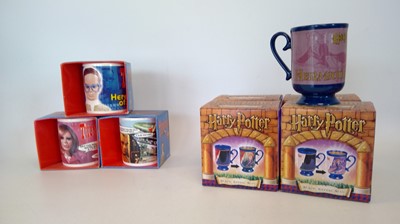 Lot 105 - Four Harry Potter Magic Reveal Mugs from 2001,...