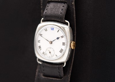 Lot 107 - A 1920's silver cushion-cased gentleman's fixed lug wristwatch.