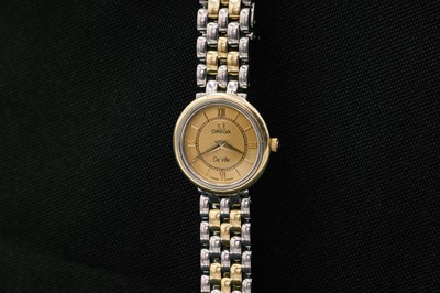 Lot 43 - OMEGA - A De Ville lady's quartz bi-colour bracelet wristwatch.