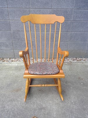 Lot 48 - A Romanian Rocking Chair. The Chair measures...