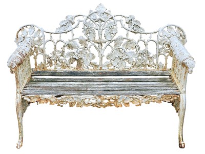 Lot 598 - A Coalbrookdale pattern cast iron garden bench.