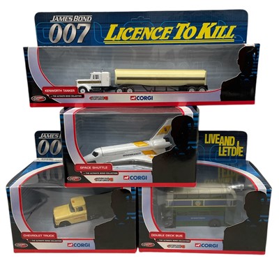 Lot 97 - A boxed collection of four die-cast metal...