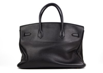 Lot 303 - HERMES - A Birkin 40 black Togo leather retourne handbag, circa 2008.